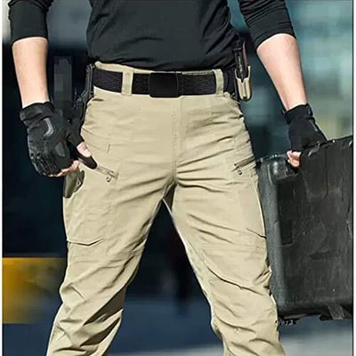 Man wearing web belt and tactical apparel